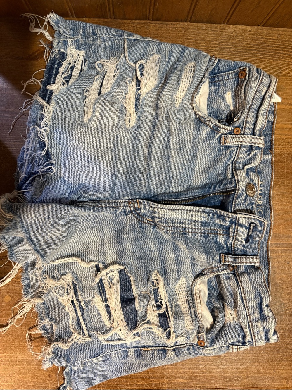 American Eagle Outfitters light blue distressed denim shorts